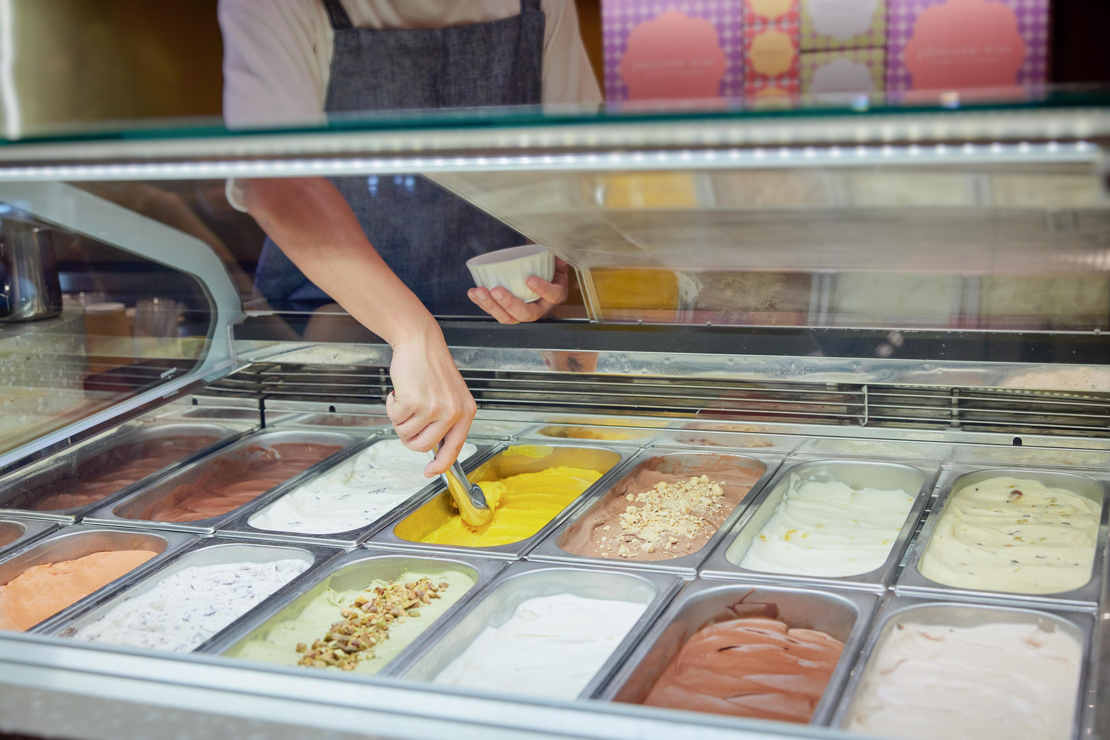 Scooping gelato ice cream at Patisserie Woo's ION Orchard outlet